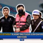 Doc. Tersangka petinggi PT Sri Rejeki Isman Tbk (Sritex) digiring oleh aparat Kejaksaan Agung RI usai ditetapkan sebagai tersangka dalam kasus dugaan korupsi pemberian fasilitas kredit dari bank negara senilai Rp3,6 triliun. Kejagung tengah menelusuri aliran dana dan potensi keterlibatan pihak internal perbankan. (Foto Dokumentasi: NR - kawanjarinews.com).