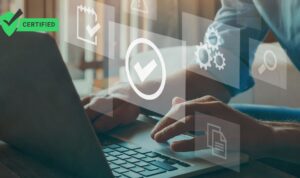 Doc. Ilustrasi seorang pengguna sedang mengakses sertifikat digital melalui laptop, dikelilingi ikon-ikon digital seperti tanda centang, kalender, roda pengaturan, dan dokumen. Di pojok kiri atas, terdapat simbol hijau bertuliskan “CERTIFIED” yang menandakan kelulusan atau sertifikasi resmi. Catatan: Gambar ini hanya ilustrasi dan tidak menggambarkan situasi atau individu sebenarnya. (Iustrasi: Eko Wahyu – kawanjarinews.com).
