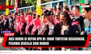 Doc: Masa buruh sedang melakukan aksi demonstrasi. Mereka tampak berbaris dan menyampaikan aspirasi di depan Gedung DPR RI. Foto ini menggambarkan suasana aksi unjuk rasa yang dilakukan oleh