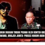 Doc. Ilustrasi: Ferry Irwandi (sisi kiri) dan perwakilan TNI (sisi kanan) digambarkan berada di lingkungan kepolisian. Ilustrasi ini digunakan untuk mendeskripsikan suasana saat proses klarifikasi terkait pemberitaan yang melibatkan nama Ferry dan respons aparat. Catatan: Gambar ini hanya ilustrasi. (NR – KawanJariNews.com).