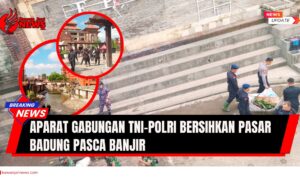 Doc. Aparat gabungan TNI, Polri, Brimob, dan instansi terkait membersihkan tumpukan sampah di kawasan Pasar Badung, Denpasar, pasca banjir yang melanda wilayah tersebut, Sabtu (13/9/2025). (Foto: Umbu Arfin – KawanJariNews.com).