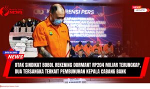 Doc. Latar belakang konferensi pers Bareskrim Polri terkait pengungkapan sindikat pembobolan rekening dormant bank BUMN senilai Rp204 miliar. Pada klose bagian depan, tampak salah satu otak sindikat dengan wajah ditutupi masker saat ditampilkan ke publik. Polisi menyebut sindikat ini tidak hanya melakukan pembobolan rekening, tetapi juga terlibat dalam penculikan dan pembunuhan Kepala Cabang Bank BUMN. (NR – KawanJariNews.com).