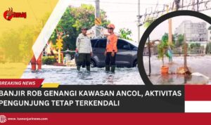 Doc. Genangan air terlihat meluas di badan jalan, dengan aliran air tampak mengalir menuju ruas-ruas jalan di sekitar lokasi terdampak banjir rob. Area yang dilingkari menunjukkan titik terendah tempat air berkumpul sebelum menyebar ke permukaan jalan di sekitarnya. (NR).