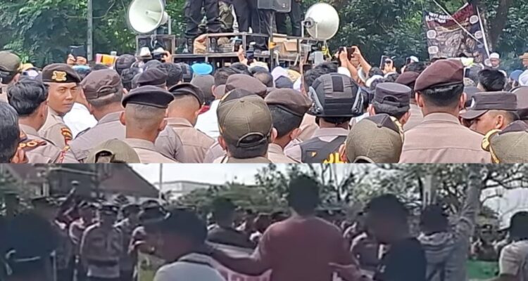 Doc. Pihak kepolisian menyampaikan tanggapan dan arahan dari atas mobil orasi saat aksi unjuk rasa sopir truk terkait kelangkaan solar subsidi berlangsung di depan Kantor Sekretariat Daerah Provinsi Kalimantan Selatan, Banjarbaru, Rabu (13/5/2026). Sementara di kloase bagian bawah, massa aksi tampak berkumpul mendengarkan penyampaian aparat sambil membawa poster tuntutan terkait distribusi BBM subsidi yang dinilai bermasalah.