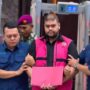 Doc. Tersangka berinisial GHS digiring petugas Kejaksaan Agung usai menjalani pemeriksaan terkait penyidikan dugaan tindak pidana korupsi dalam tata kelola Program Makan Bergizi Gratis (MBG) periode 2025–2026, Kamis (18/6/2026). GHS tampak mengenakan rompi tahanan Kejaksaan Agung saat dibawa menuju kendaraan tahanan untuk menjalani proses hukum lebih lanjut.