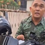 Doc. Tangkapan layar video yang beredar di media sosial memperlihatkan Syaiful Anwar saat mengendarai sepeda motor melintas di atas trotoar dan mendapat teguran dari seorang pejalan kaki di Jalan Kartini, Kota Depok, Jawa Barat, Jumat (3/7/2026). Insiden tersebut kemudian viral setelah Syaiful mengaku sebagai anggota TNI, namun belakangan telah mengklarifikasi bahwa dirinya bukan anggota TNI dan menyampaikan permohonan maaf.