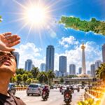 Doc. Ilustrasi cuaca panas di Pulau Jawa saat fenomena kulminasi Matahari pada Oktober 2026. Terik Matahari, warga yang melindungi diri dari sengatan panas, serta termometer menggambarkan kondisi cuaca yang terasa menyengat. BMKG menjelaskan bahwa kulminasi Matahari tidak serta-merta menyebabkan peningkatan suhu udara secara drastis karena kondisi cuaca juga dipengaruhi faktor atmosfer dan tutupan awan. Foto merupakan ilustrasi, bukan dokumentasi kondisi cuaca aktual.