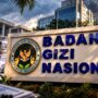 Doc. Ilustrasi gedung Badan Gizi Nasional (BGN) dengan dokumen dan grafik pemeriksaan sebagai gambaran tindak lanjut temuan Badan Pemeriksa Keuangan (BPK) RI terkait pengelolaan anggaran dan pengembalian dana ke kas negara.